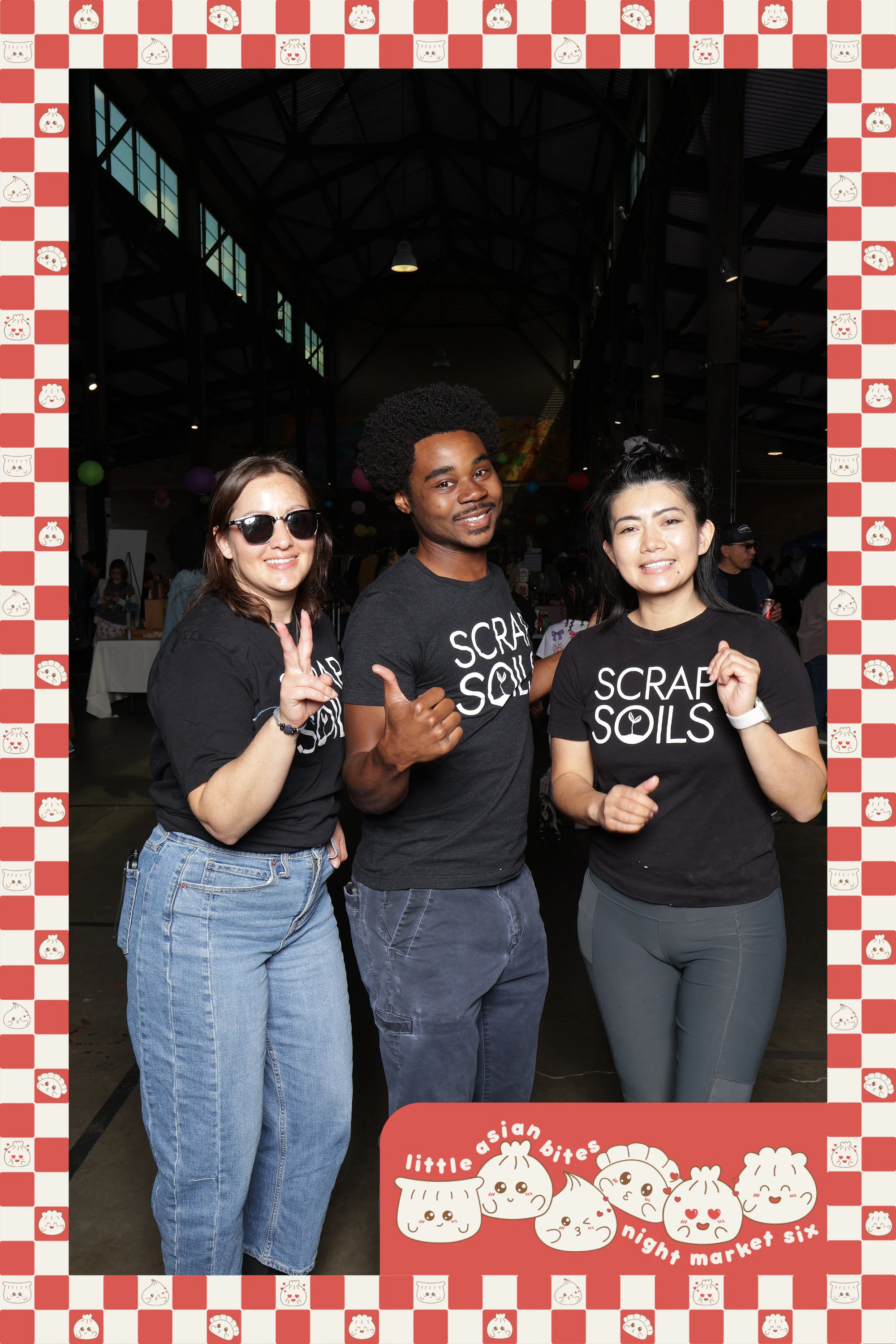 Three in sunglasses and matching tees, peace signs