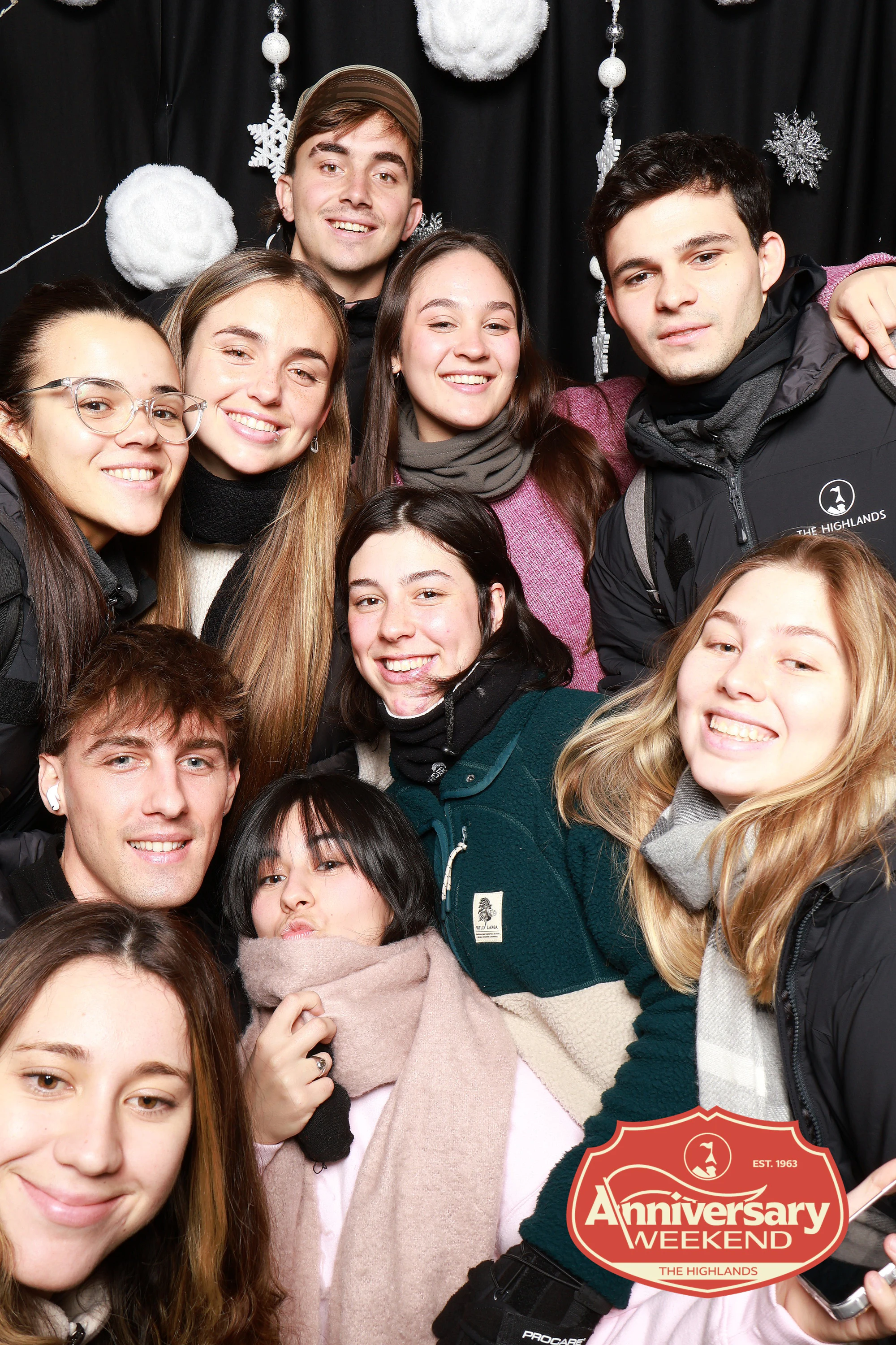 Eight friends packed into one Portrait Booth frame at The Highlands Anniversary Weekend