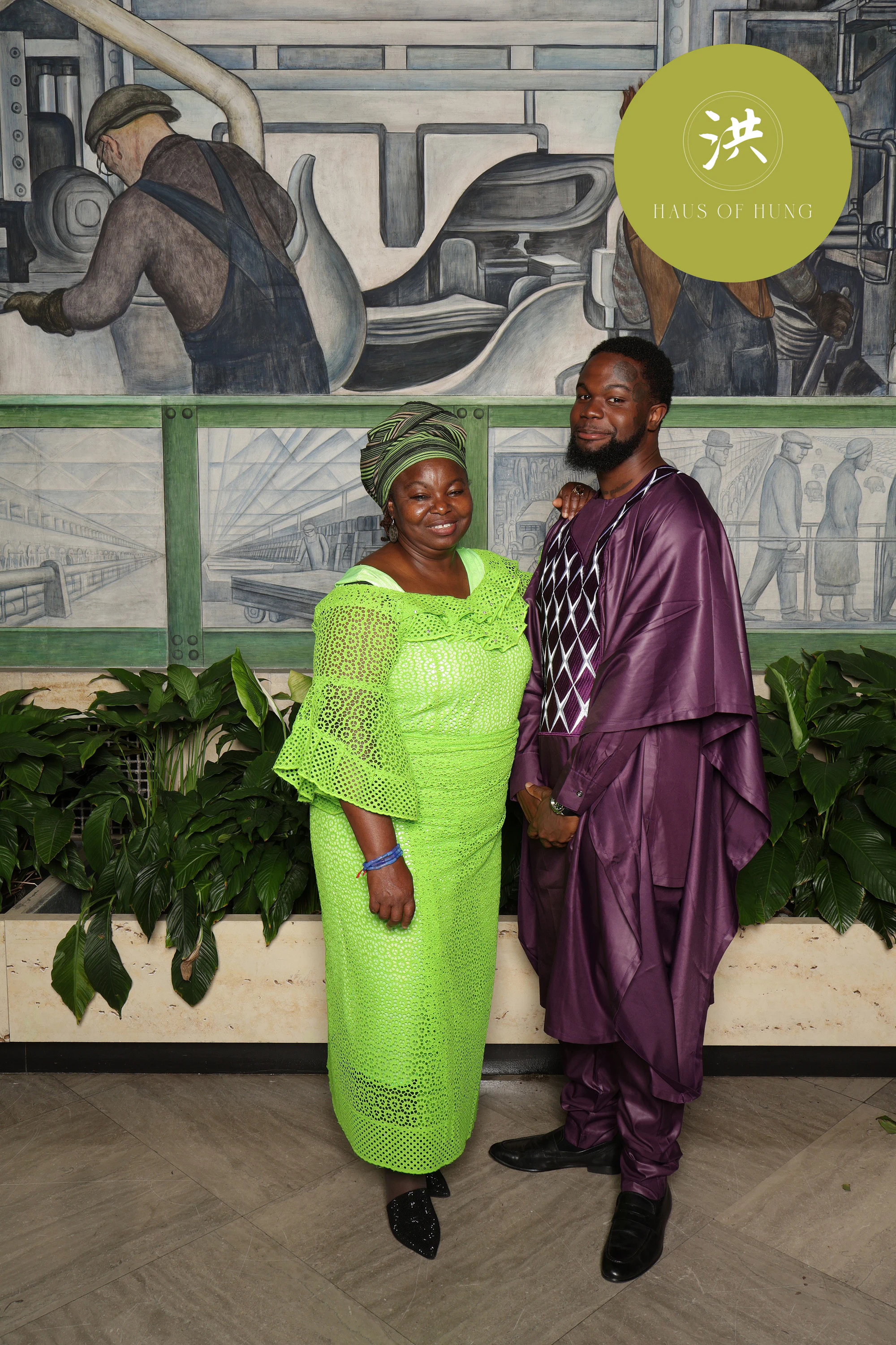 Couple in green and purple traditional dress at Lesley + Kevin at the Detroit Institute of Arts