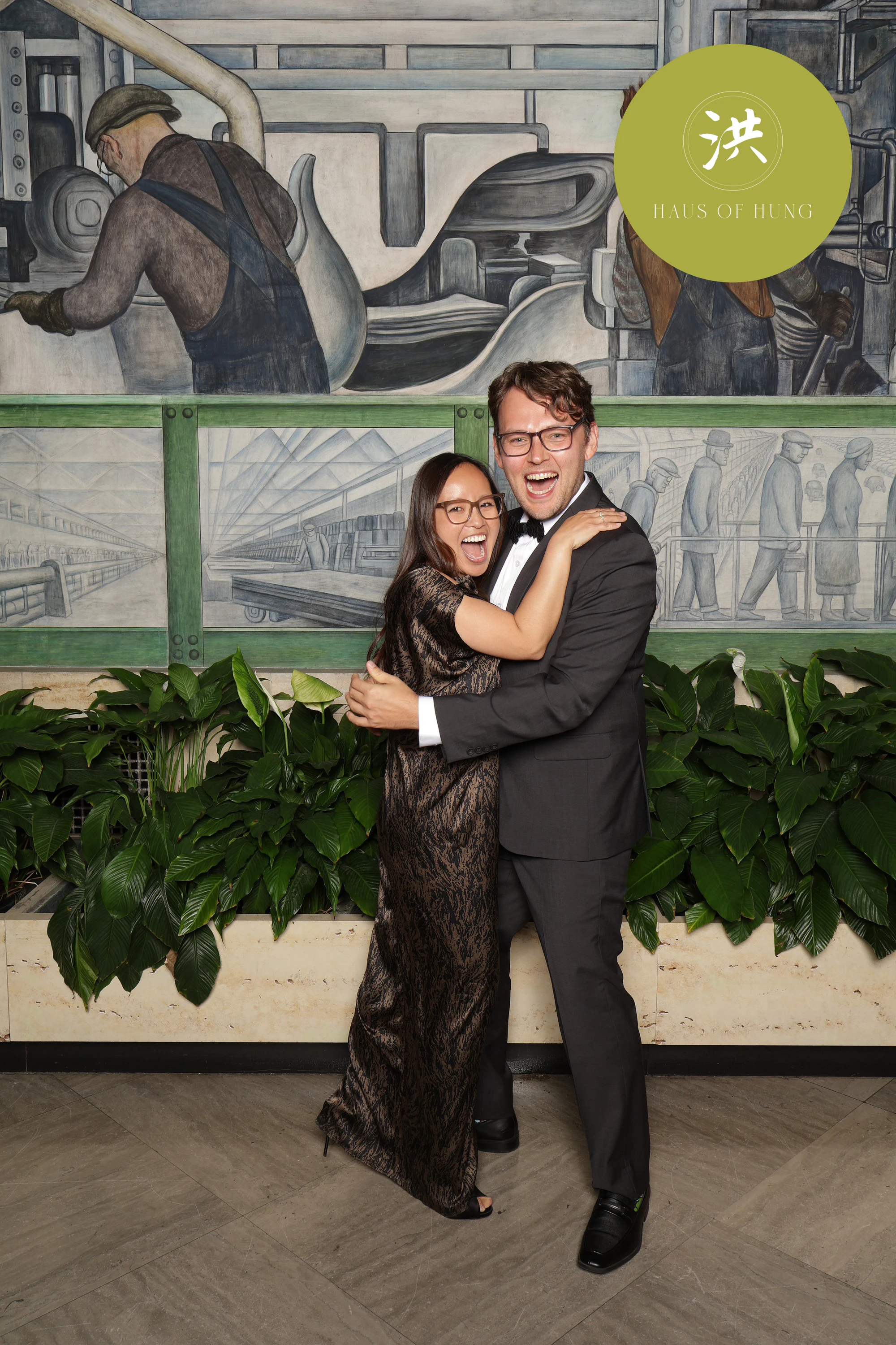 Couple embracing at Lesley + Kevin at the Detroit Institute of Arts