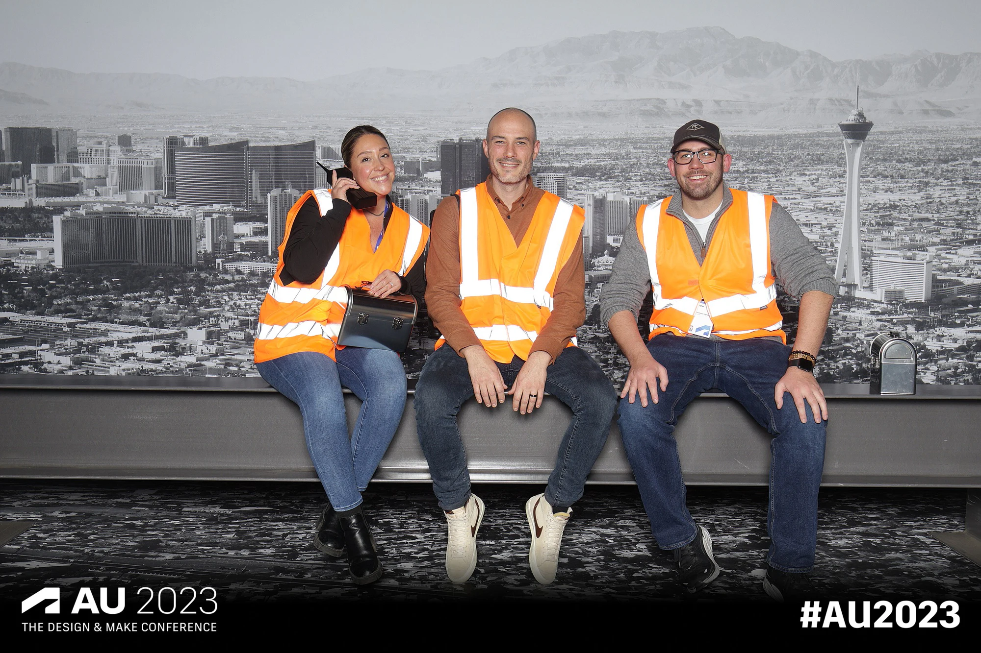 Three on the girder with a lunchbox and a radio at Autodesk University 2023