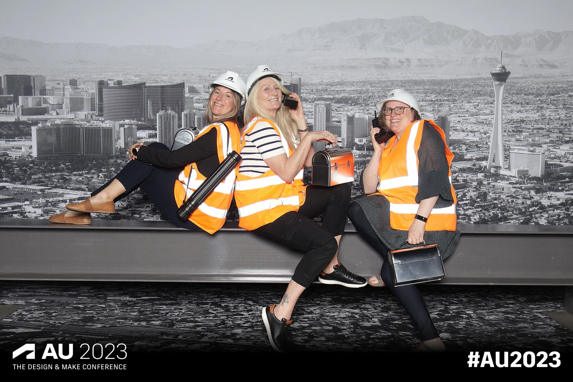Four leaning together on the girder, relaxed at Autodesk University 2023