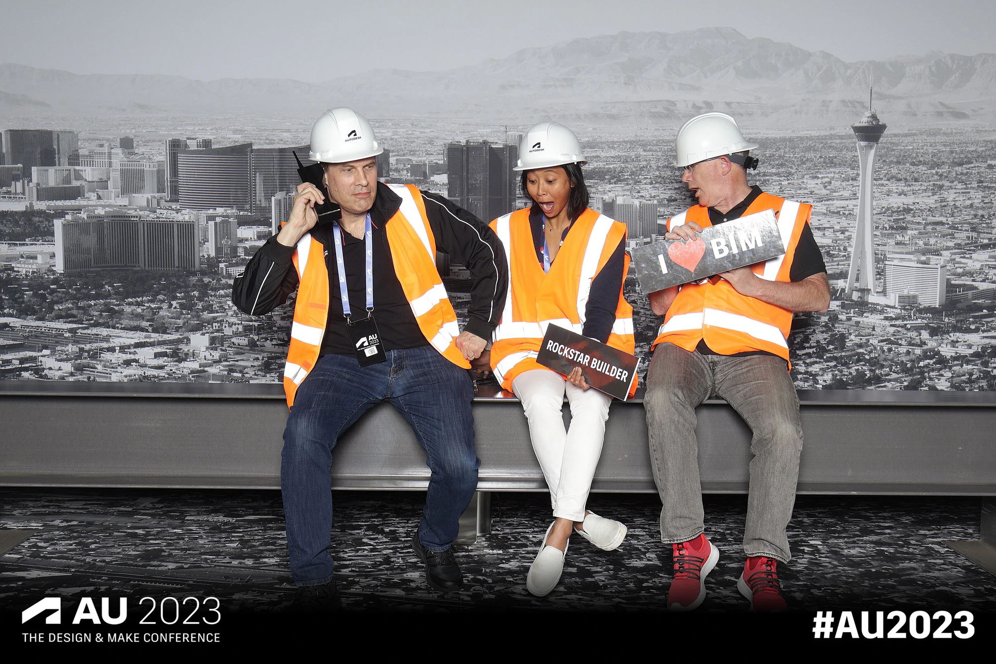 Three relaxed on the girder at Autodesk University 2023