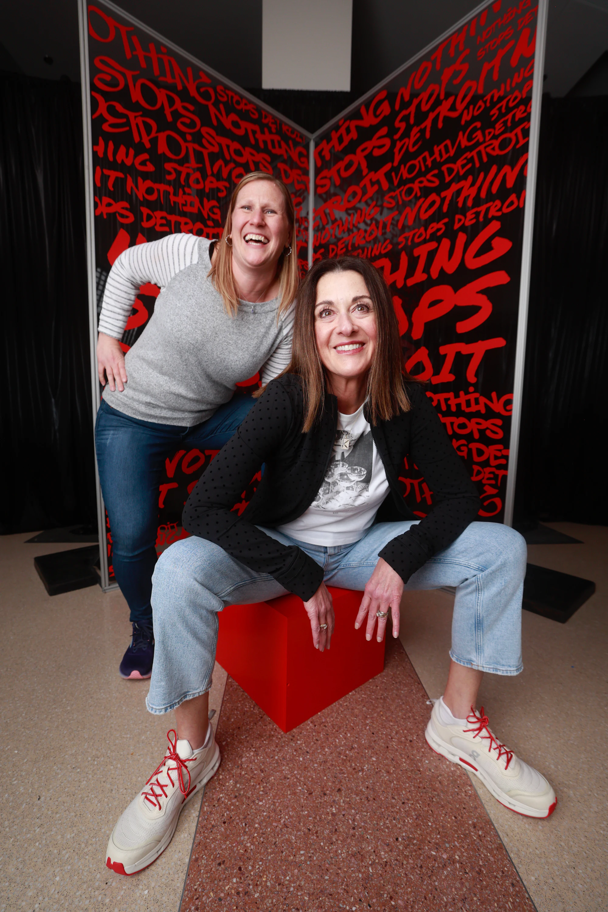 Two women on the cube