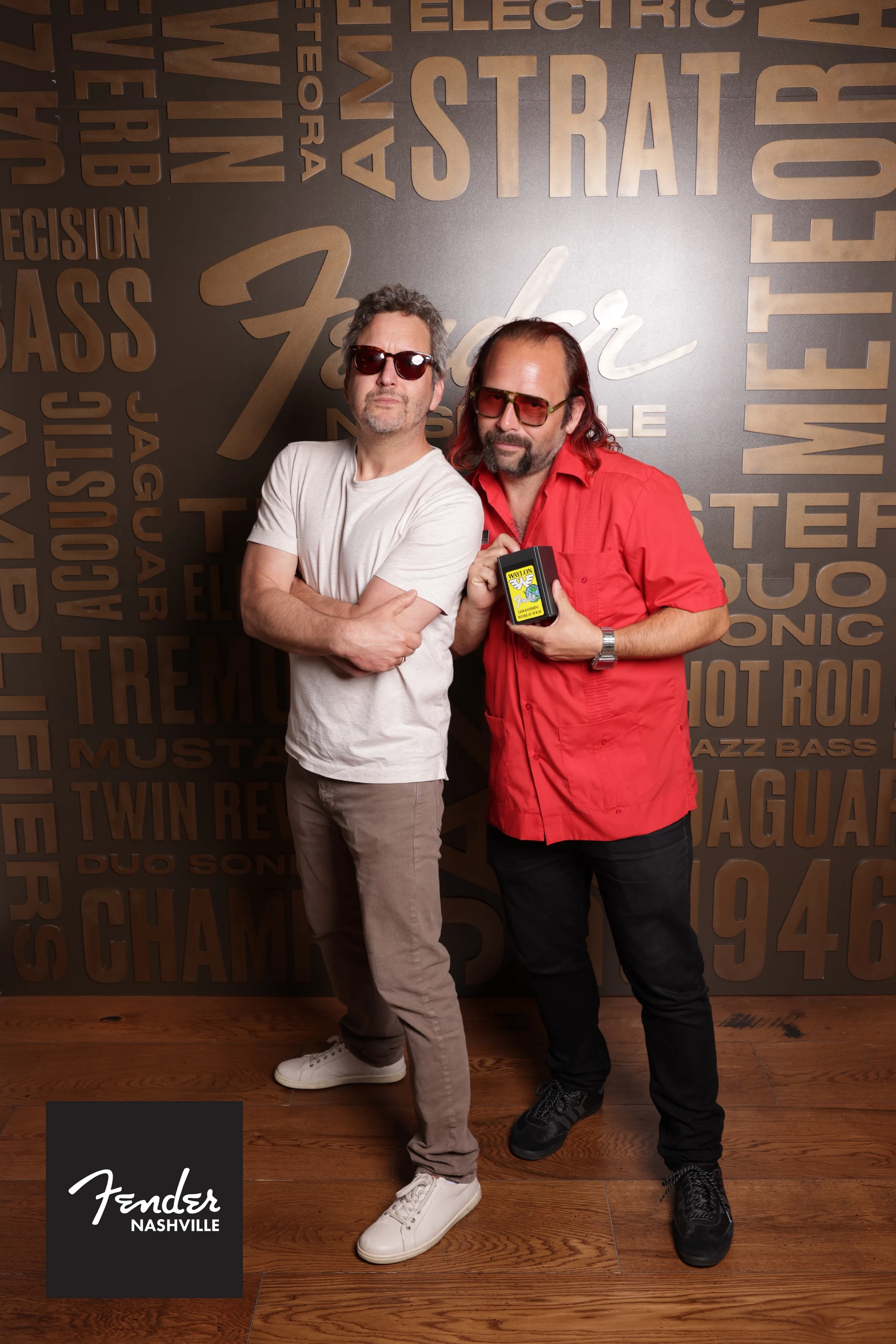Two men in sunglasses, arms folded at Fender Nashville Grand Opening Portraits