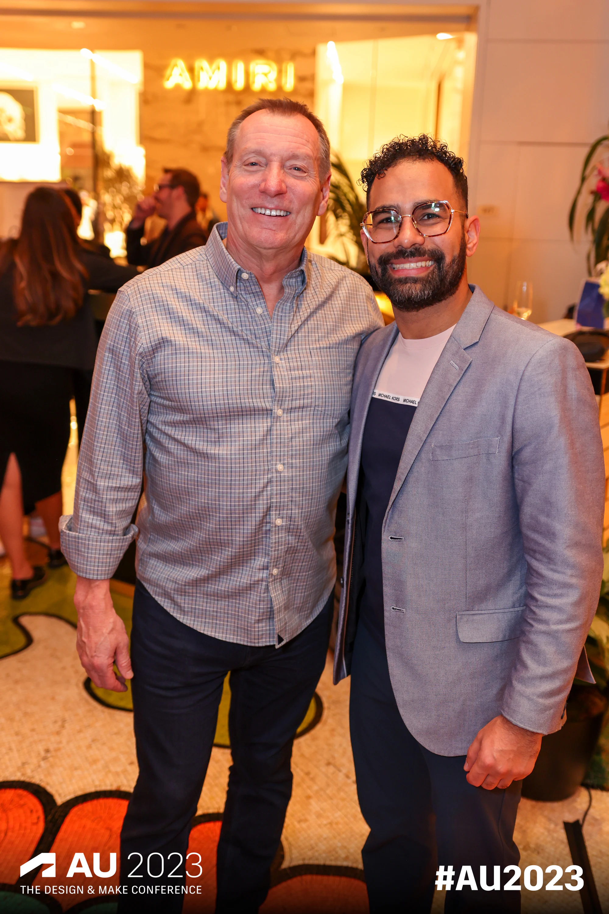 Two men at the VIP party at Autodesk University 2023