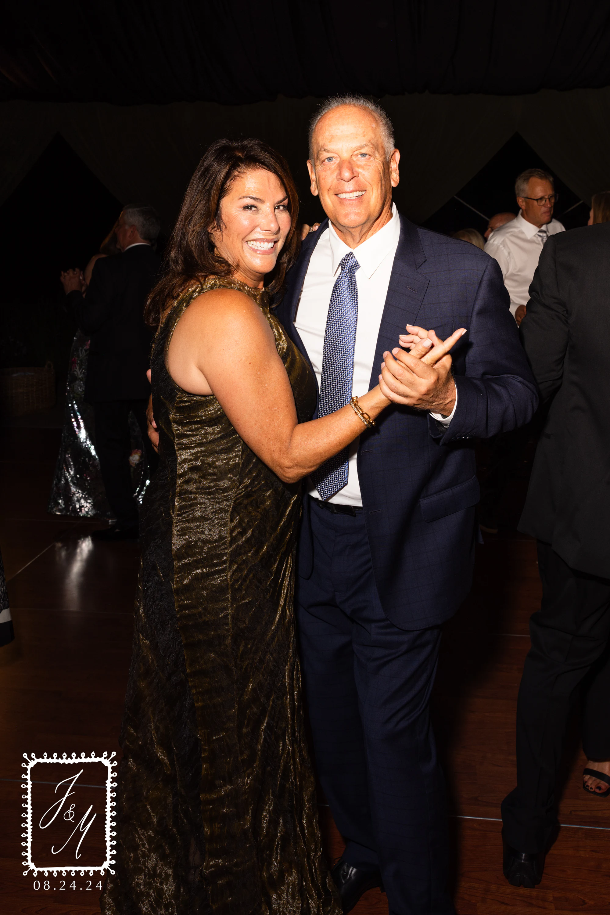 Couple dancing, the flash freezing the move, at Jaclyn + Michael at Franklin Hills Country Club